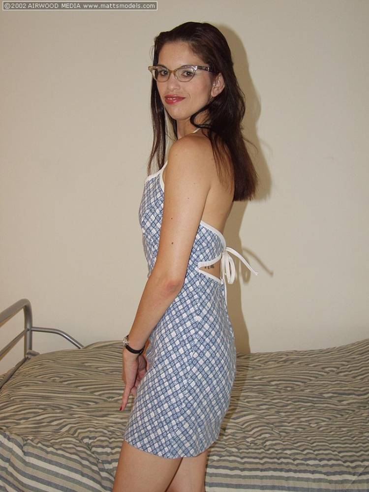 Geeky amateur Angelina removes her dress and glasses for her first nude poses - #3
