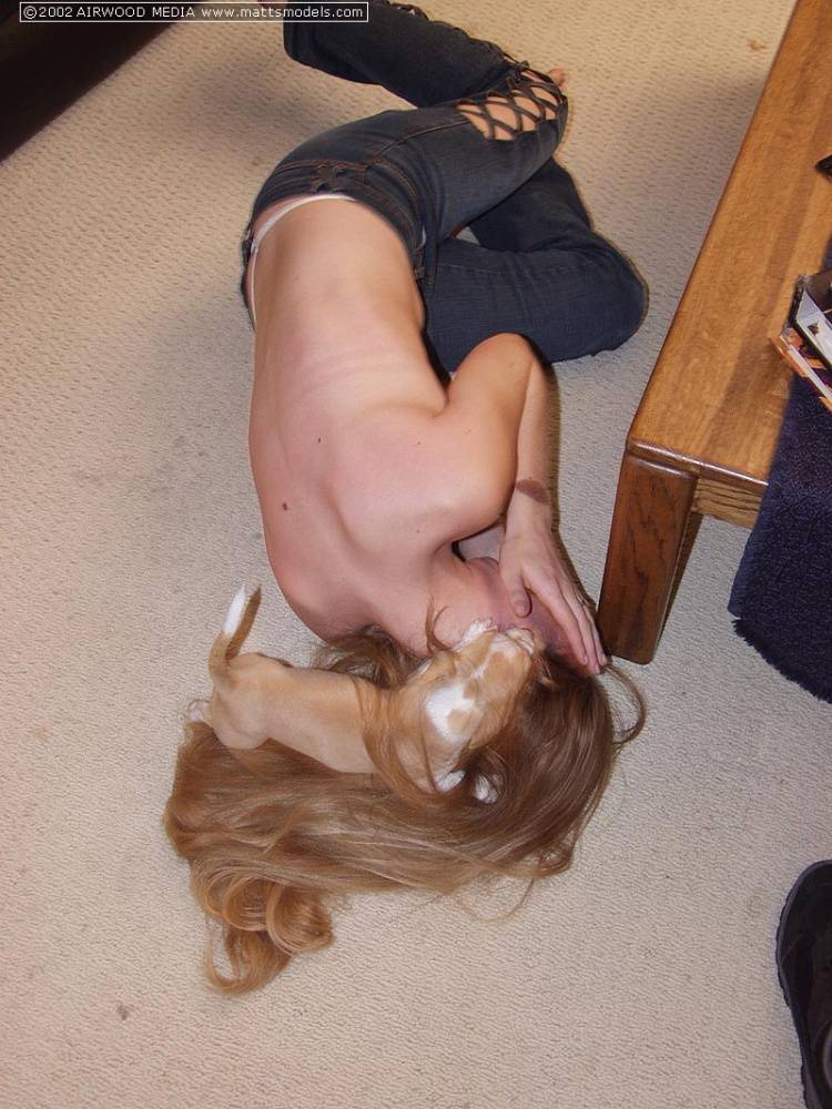 Redhead amateur Britney holds a puppy in her arms while completely naked - #8