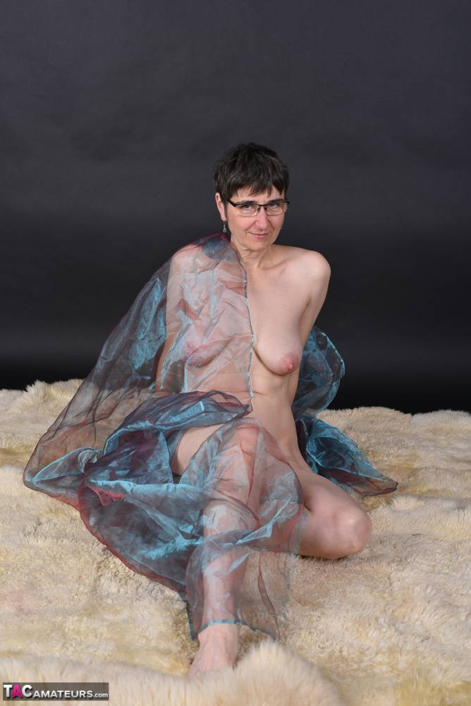 Middle-aged amateur models totally naked while wrapped up in sheer fabric - #11