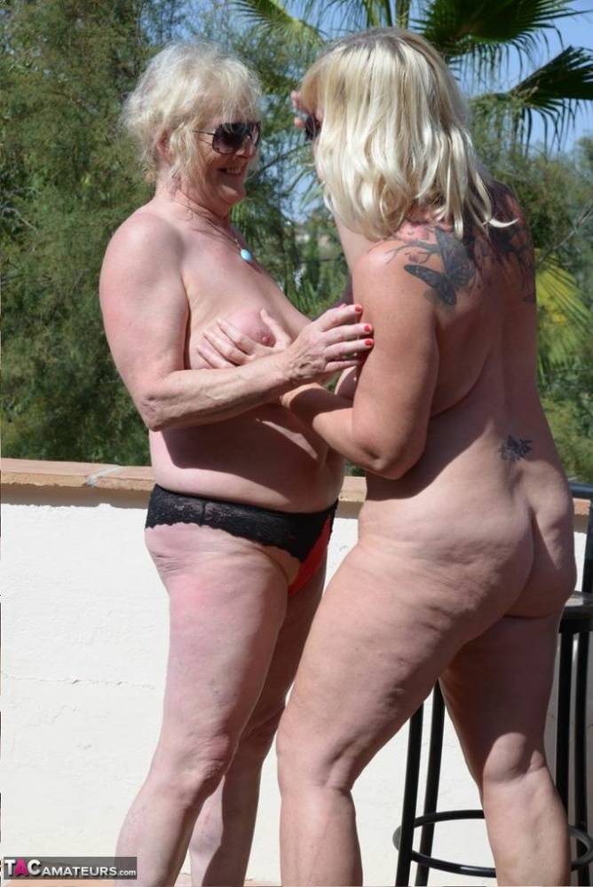 Fat granny Melody & her chubby MILF buddy sun their naked saggy tits outdoors - #5