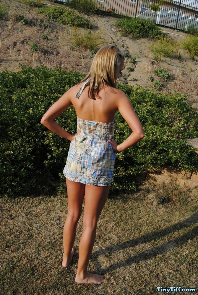 Blond amateur Tiny Tiff removes a summer dress and thong to stand nude outside - #11