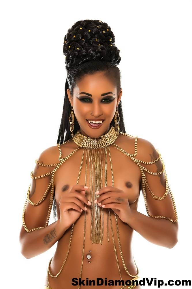 Scary ebony MILF Skin Diamond shows her fangs while posing her hot naked body - #9
