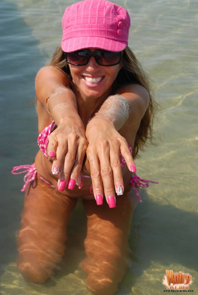Amateur model Lori Anderson shows her hairy arms while wearing a bikini - #14