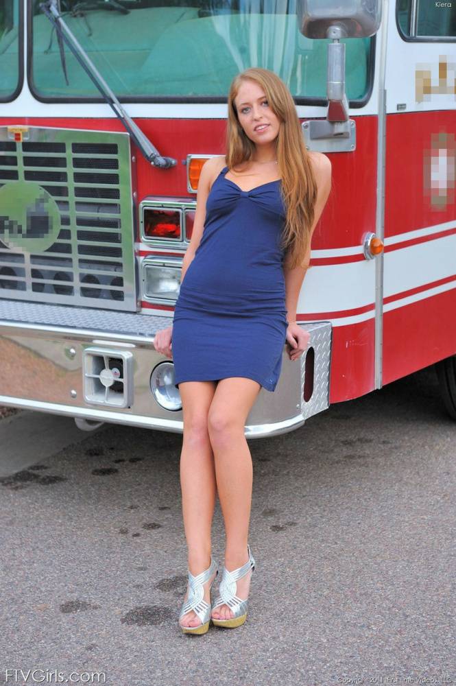 Wild redhead Kiera shows off her amazing curves on a fire truck - #7