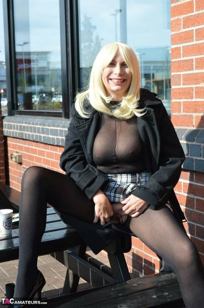 Older blonde Barby Slut flashes her pussy in public wearing crotchless hose - #6