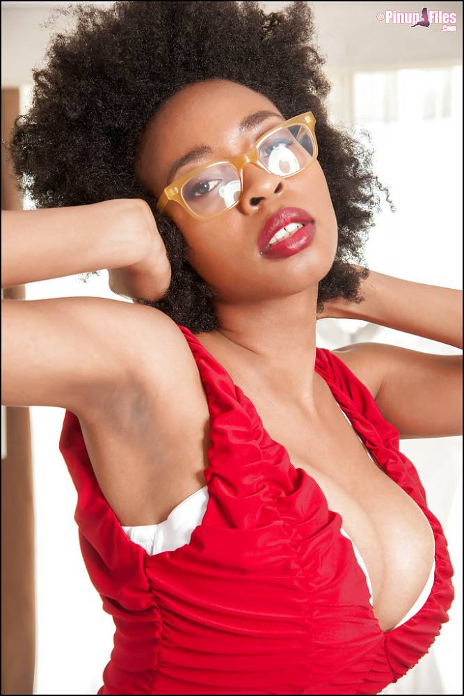 Ebony slut demonstrates her big tits in sexy glasses and red panties - #11