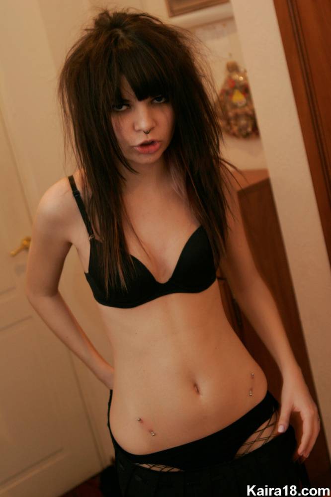 Skinny teen Kaira 18 smoke while getting naked in a SFW manner - #9
