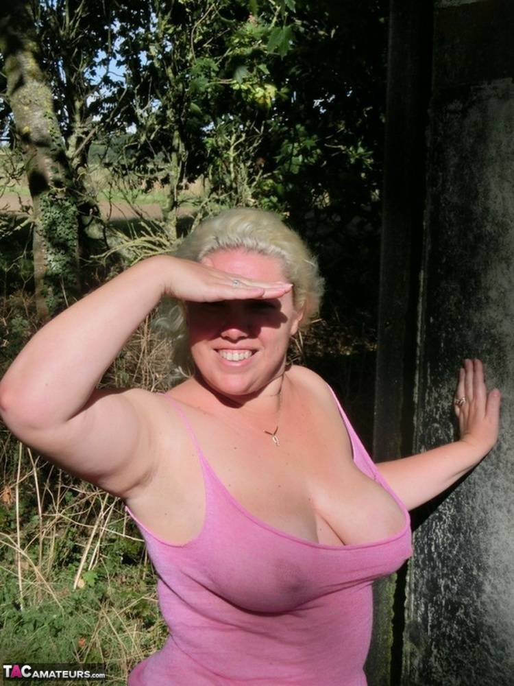 Thick blonde Barby bares her saggy boobs and bald cunt in a rural location - #14