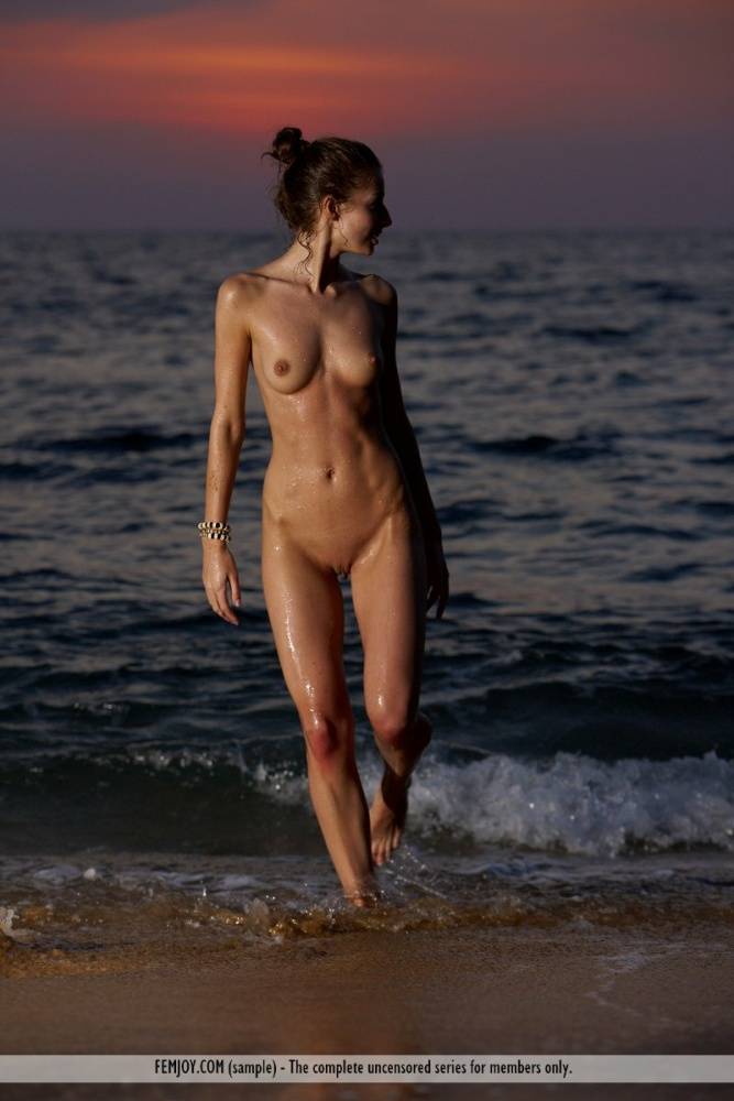 Skinny girl Katelin models totally naked while attending a sandy beach - #4