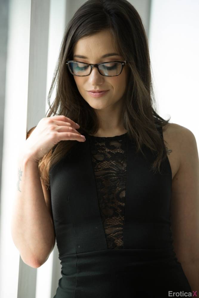 Babe in glasses Maya Bijou takes off her black lingerie exposing perky tits - #11