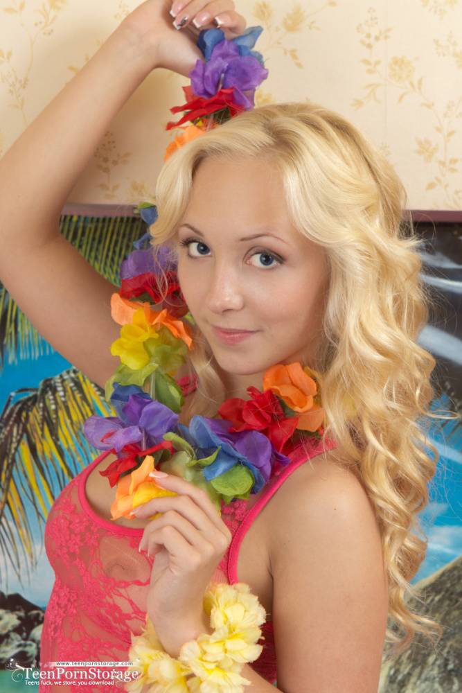 Young blonde girl Linet gets naked after attending a luau - #7
