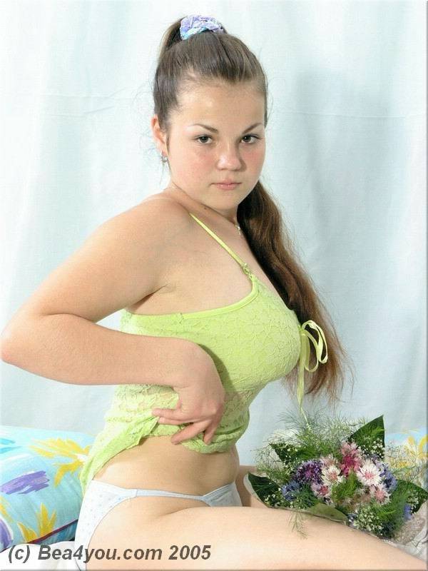 Chubby teen Bea wears her long hair in 2 strands while getting naked on a bed - #1