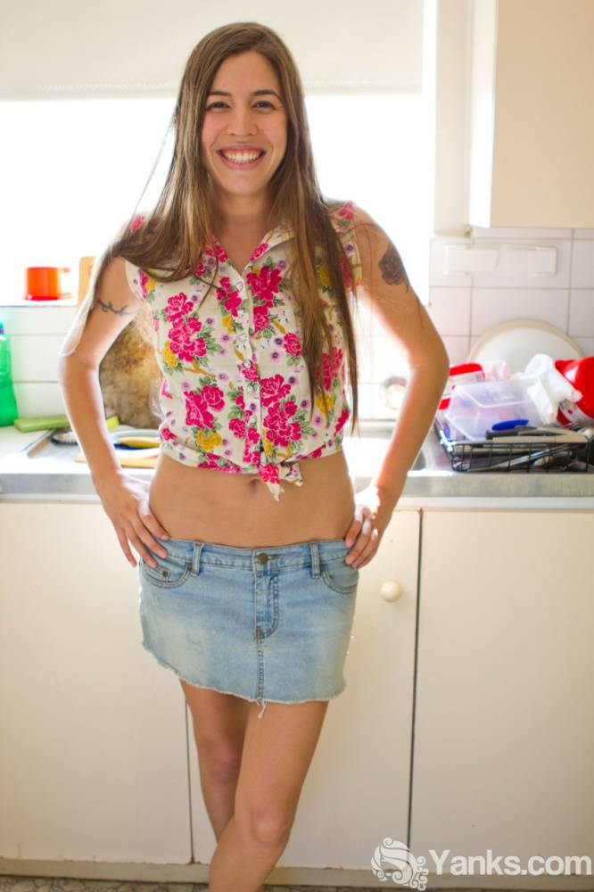 Long haired girl Lily B stands naked in the kitchen during her debut - #7