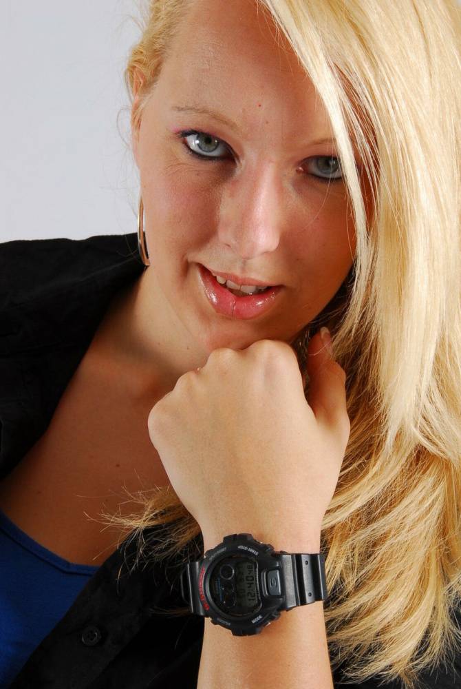 Blue-eyed blonde Britt displays her black G-Shock during non-nude action - #10