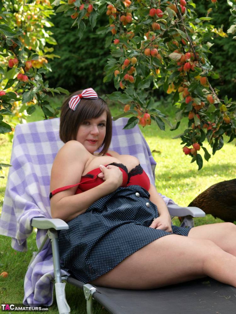 Fat amateur Roxy shows her bare legs in a short dress in the backyard - #15
