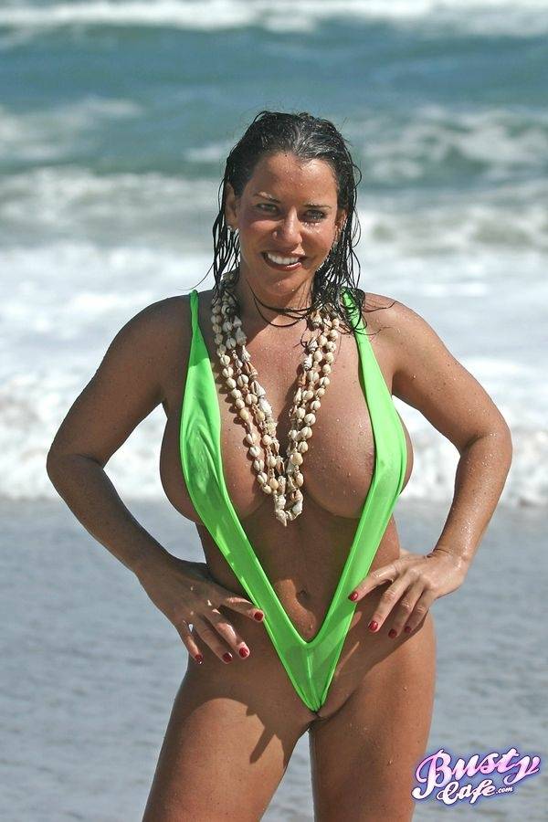 Amply endowed female Alicia Dimarco struts in a v-bikini amid foamy surf - #9