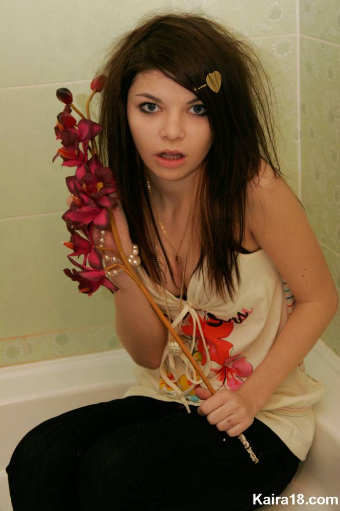 Tiny teen Kaira 18 scrunches up her face during a non nude shoot in a bathroom - #7