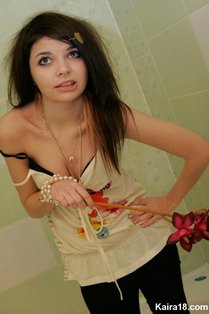 Tiny teen Kaira 18 scrunches up her face during a non nude shoot in a bathroom - #10