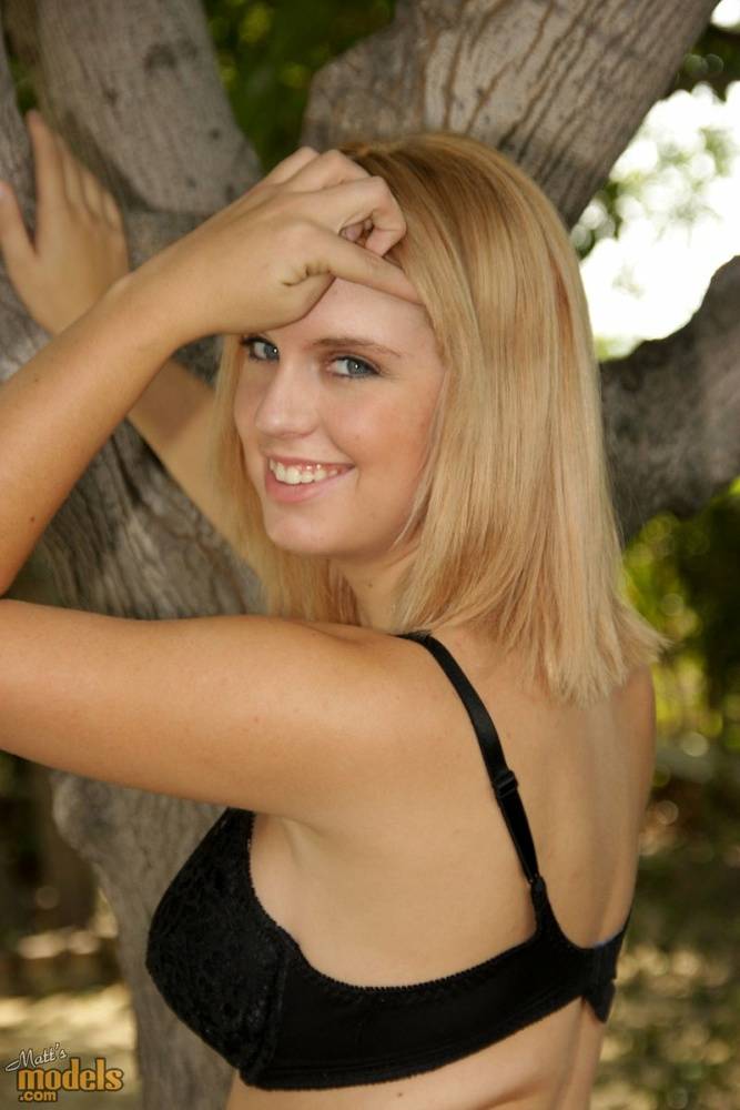 Blonde amateur Jessika flashes upskirt panties before modeling naked in yard - #5