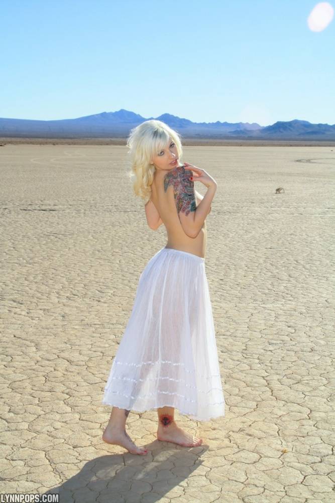 Sexy blonde Lynn Pops goes topless on a dry lake before exposing her vagina - #5