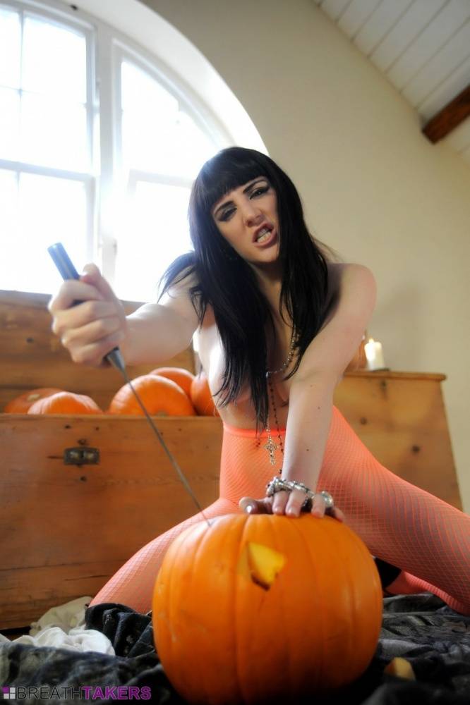 Goth babe Sam Bentley carves a pumpkin while topless in see thru pantyhose - #10