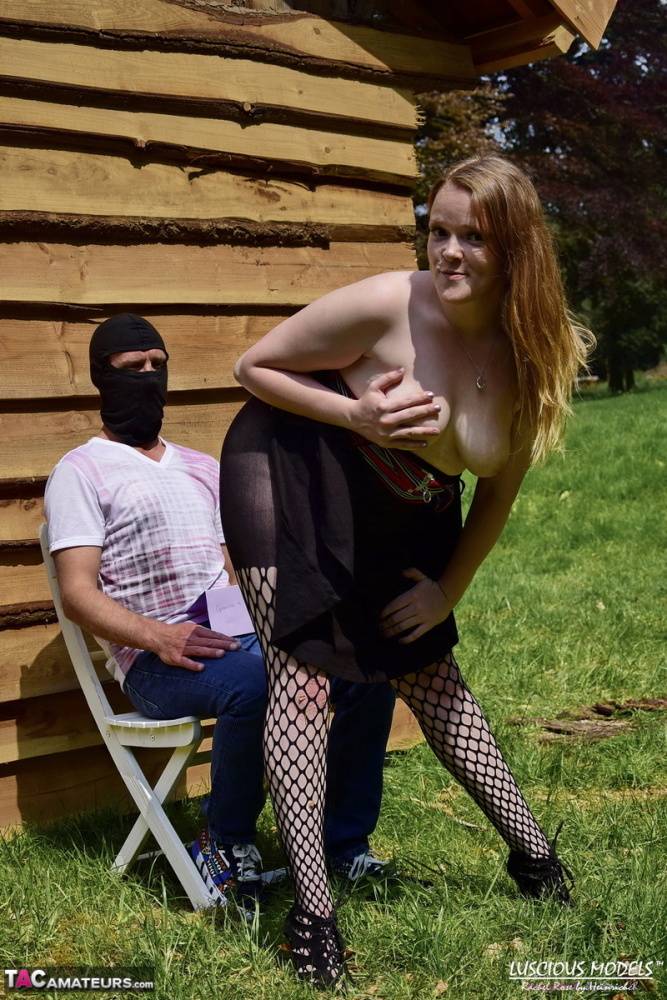 Natural redhead masturbates on a lawn before teasing a masked man - #3