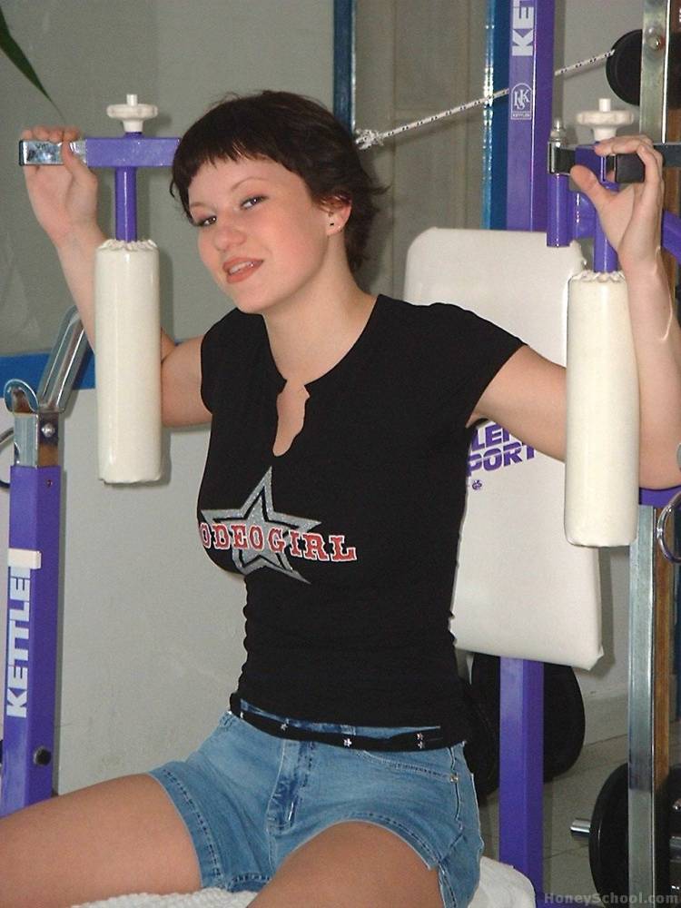 Big titted teen sports short hair while getting naked during a working out - #6
