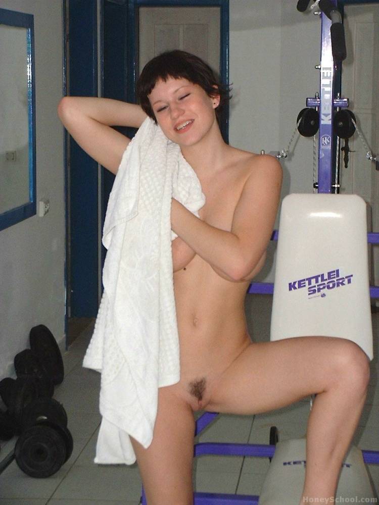 Big titted teen sports short hair while getting naked during a working out - #13