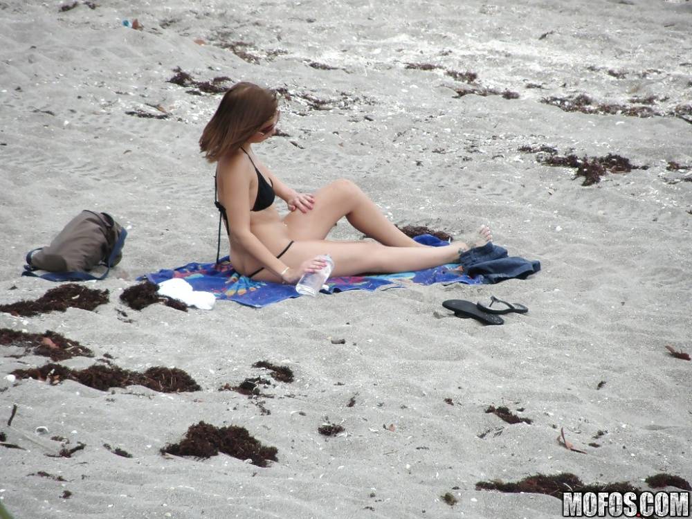 Brunette teen Krystal Banks gets sneak-peaked by a voyeur on the beach - #4