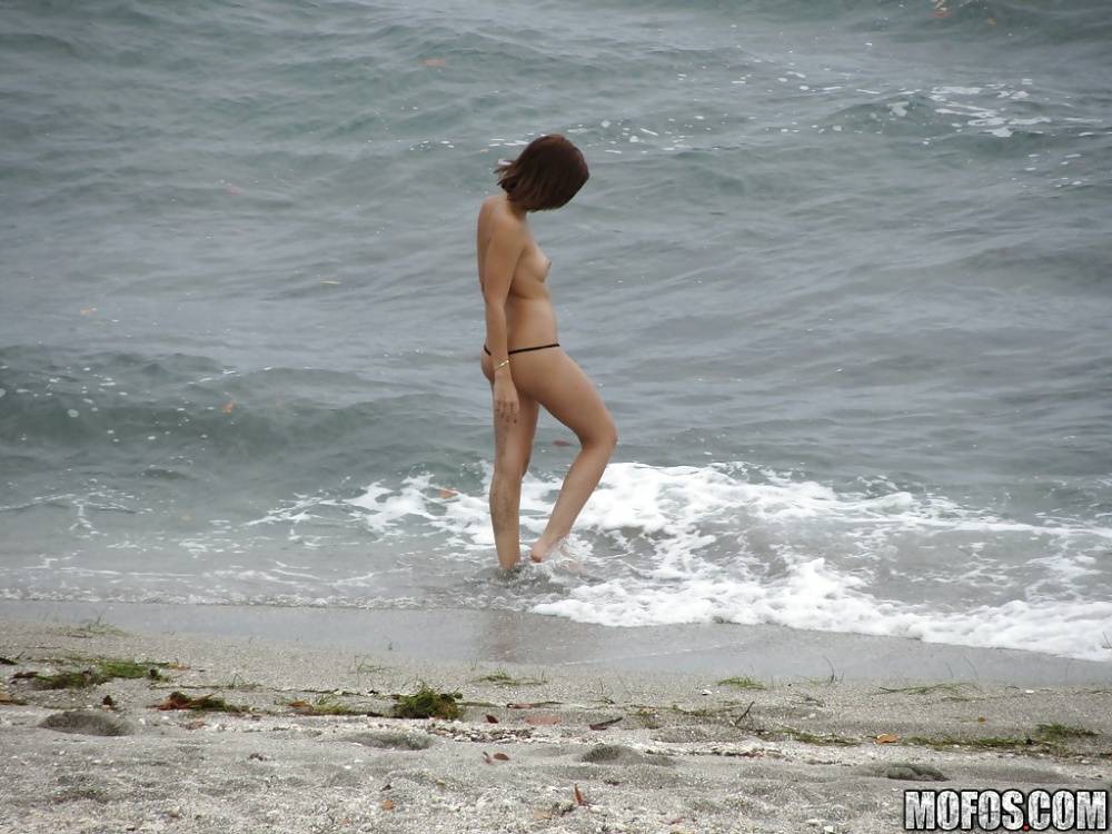 Brunette teen Krystal Banks gets sneak-peaked by a voyeur on the beach - #3
