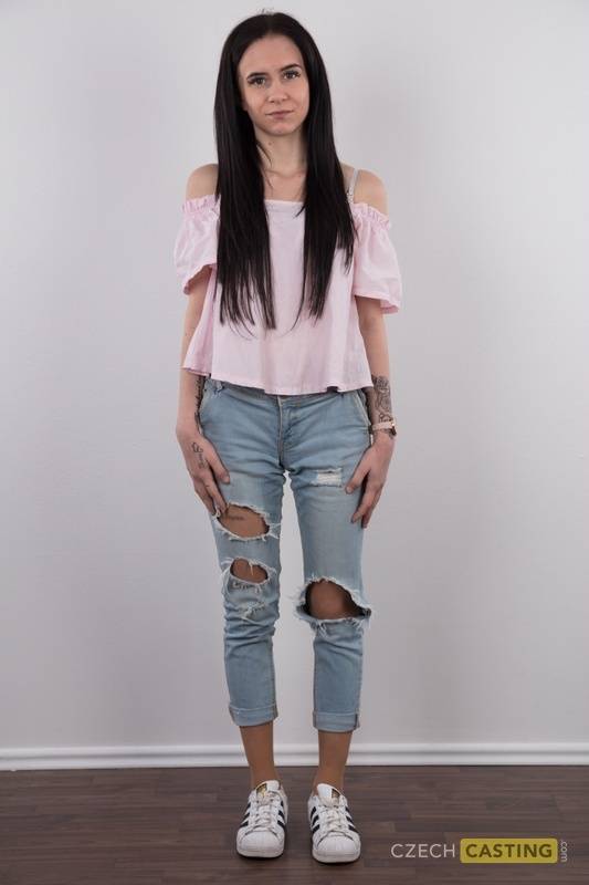 Long haired female Barbora models in ripped jeans before standing bare naked - #4
