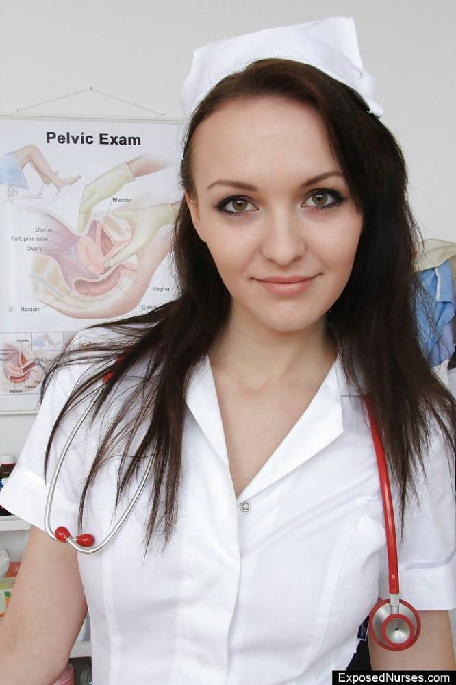 Stunning nurse brunette Belle spreading her mouth and pink pussy - #2