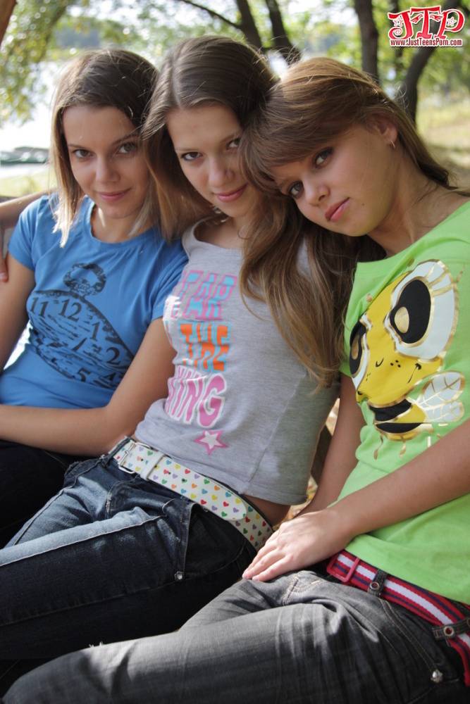 3 young girls remove T-shirts and jeans to model naked on park bench - #10