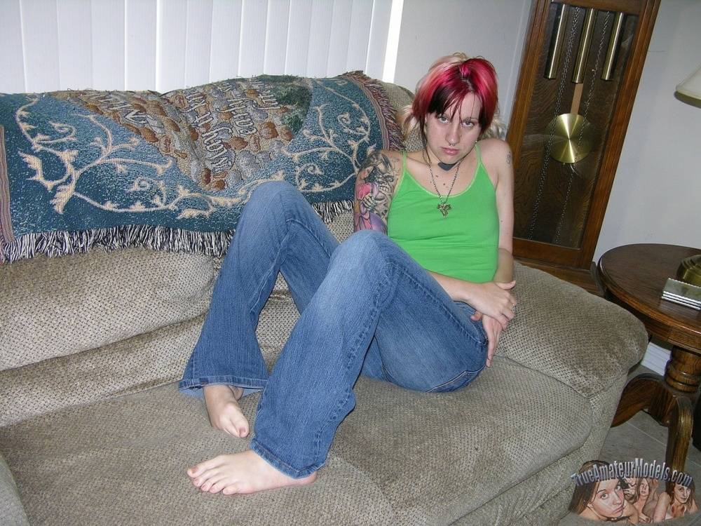 Amateur girl with piercings and dyed hair shows her natural pussy on love seat - #11