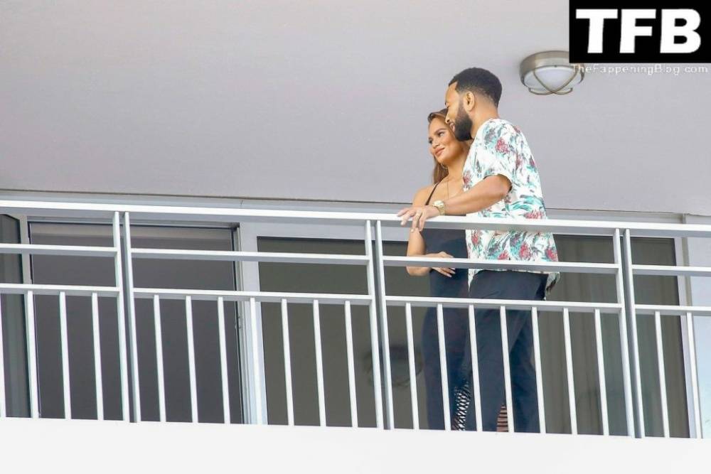 Chrissy Teigen & John Legend Kiss and Pose During an Impromptu Balcony Shoot - #17