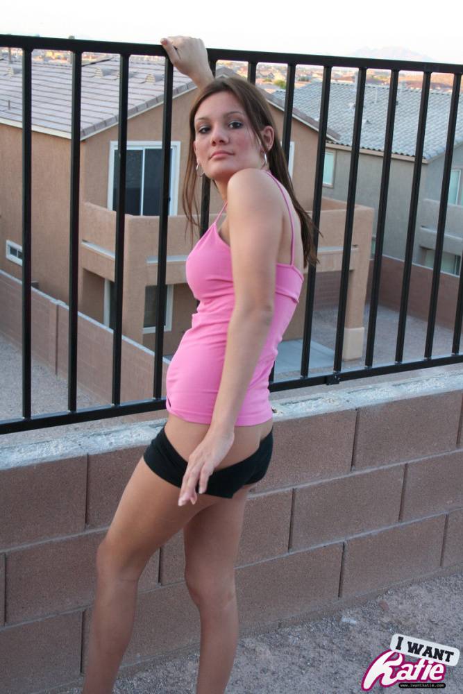 Naughty teen girl Kate Crush bares her tight ass out on the balcony - #4