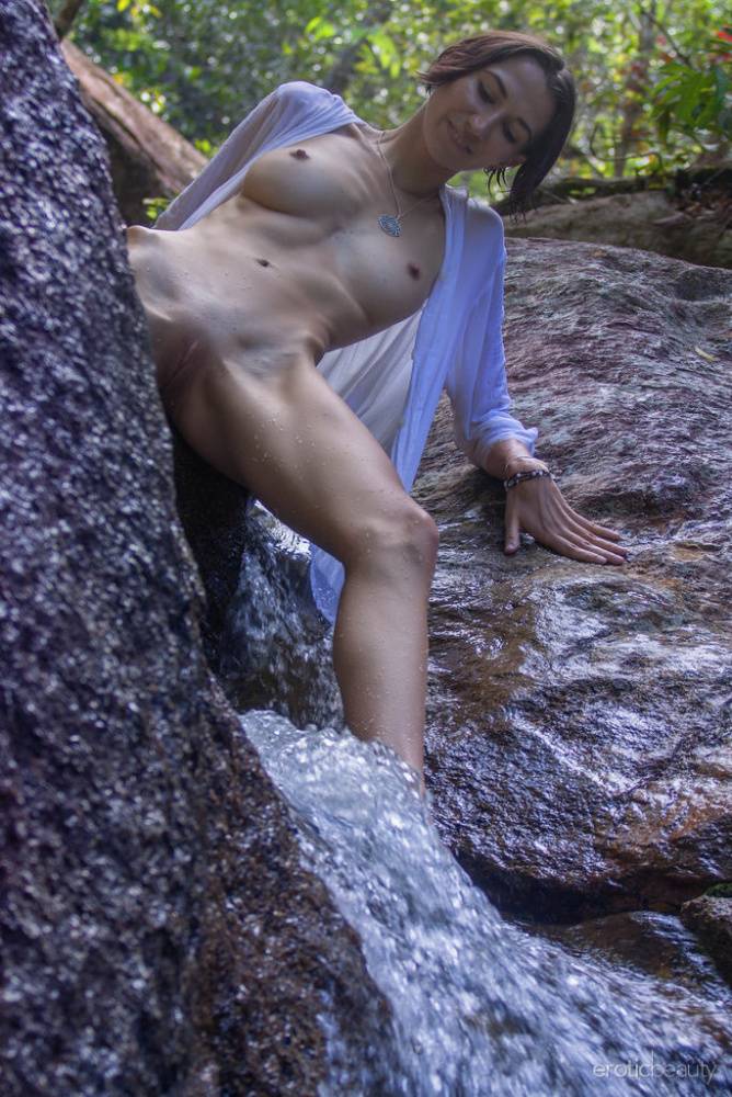 Slender teen Alisa M shows her naked body in a stream of fast-moving water - #11