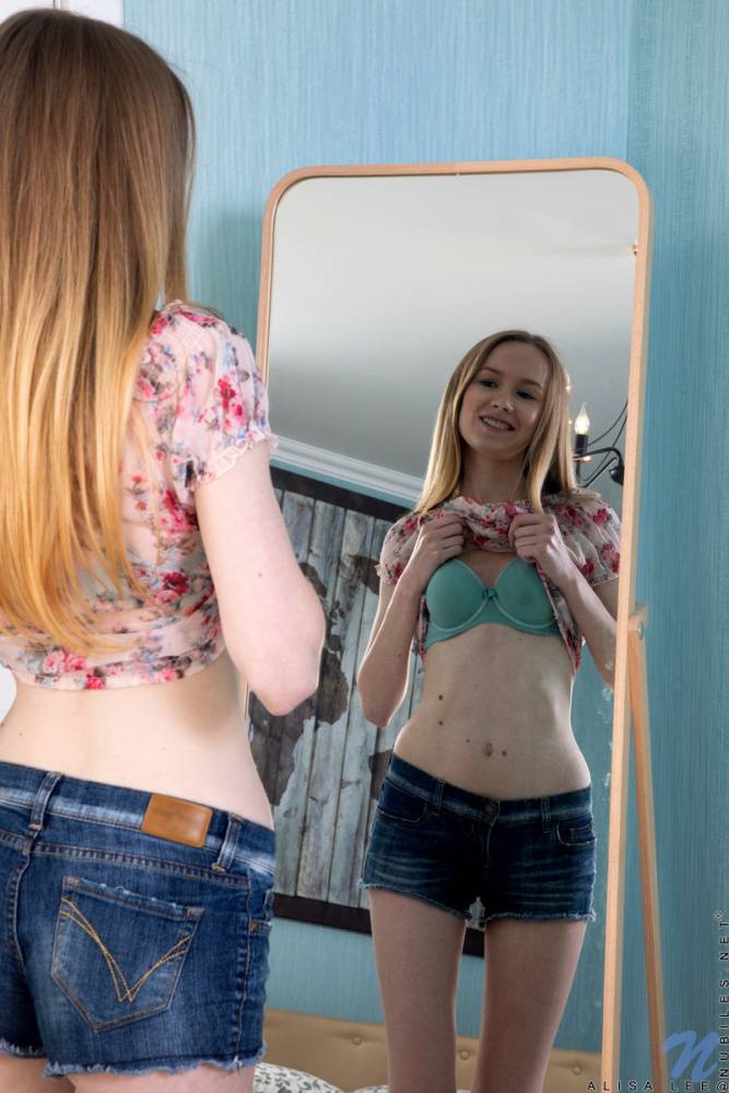 Leggy teen Alisa Lee admires her slender figure in a bedroom mirror - #7