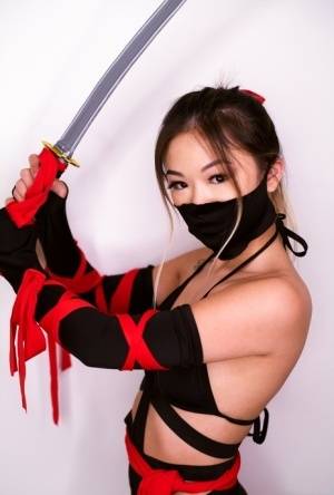 Petite Asian teen Lulu Chu wields a samurai sword before fucking - #main