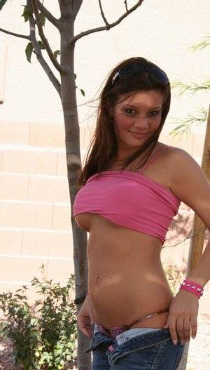 Amateur chick Kate Crush sets her perky tits free outdoors in denim jeans - #main