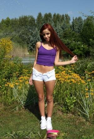 Young redhead Vanna Bardot does a handstand after getting naked in sneakers - #main