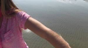 Amateur chick Lori Anderson shows off incredibly hairy forearms by the water - #main