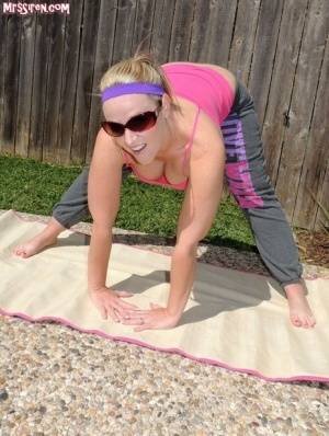 Blonde chick Dee Siren frees her huge ass from yoga pants outdoors on yoga mat - #main
