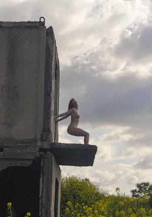 Natural redhead Elis B poses for a daring nude shoot in an derelict building - #main