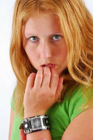 Natural redhead Judy models a double buckle cuff watch during SFW action - #main