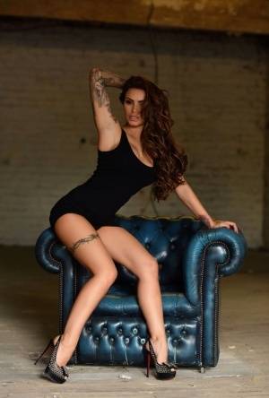 Tattooed model Gemma Massey works clear of a black dress to pose nude in heels - #main