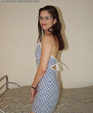 Geeky amateur Angelina removes her dress and glasses for her first nude poses - #main