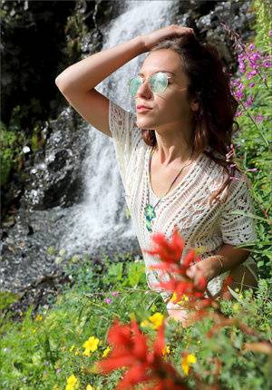 Glamour model takes off her dress to pose naked by a waterfall - #main
