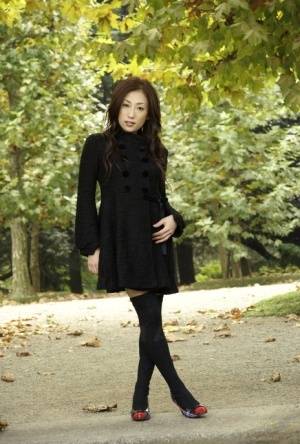 Fully clothed Japanese teen models in the park in black clothes and stockings - #main