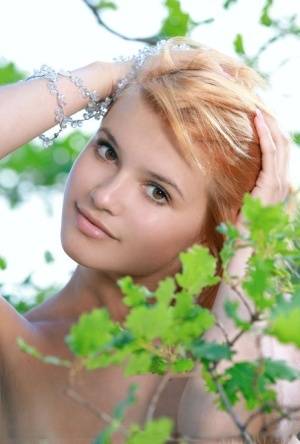 Adorable redhead Violla A displays her naked teen body atop a rock outdoors - #main